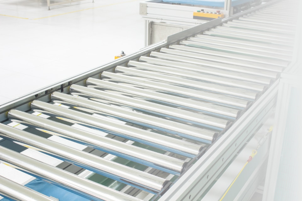 An image of a roller conveyor made from metal.